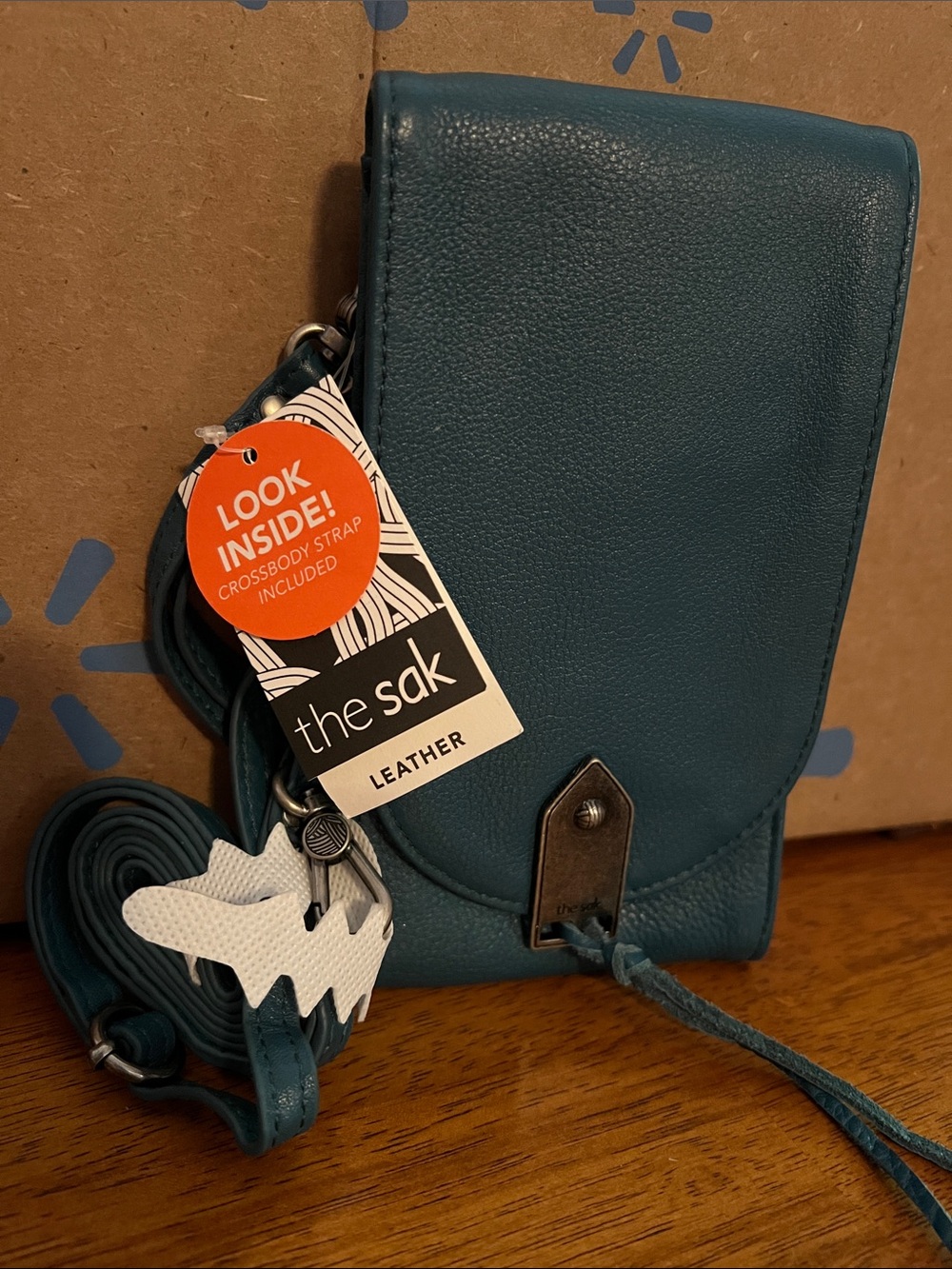 the sak Teal Leather Crossbody Phone Bag with Tassel Accent